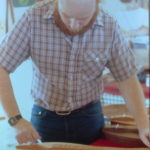 Man playing a dulcimer