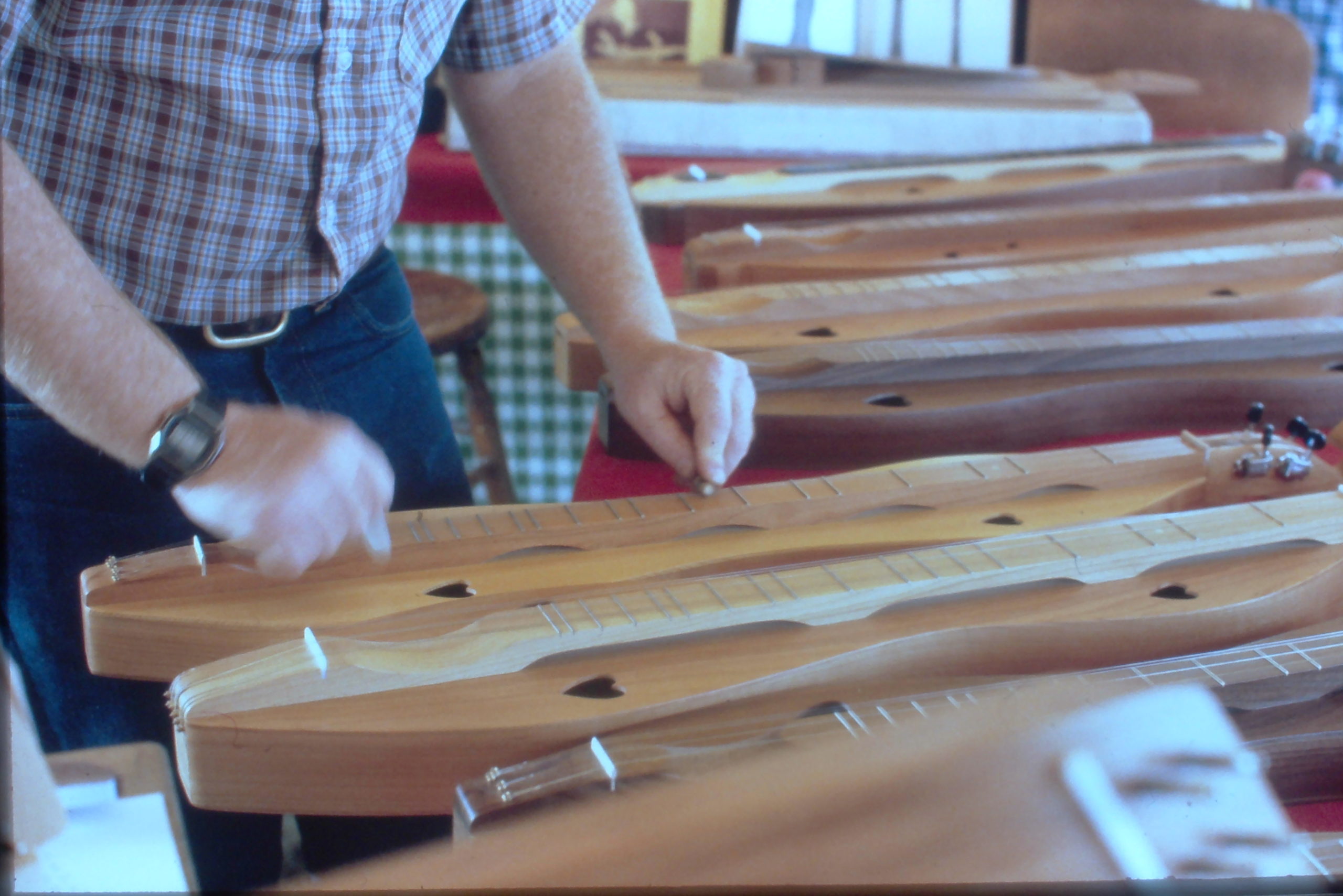 Man playing a dulcimer